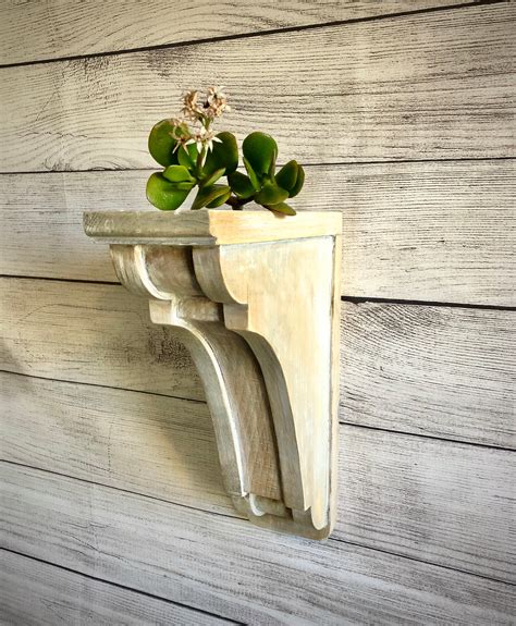 metal corbel shelf brackets|decorative wooden shelf brackets.